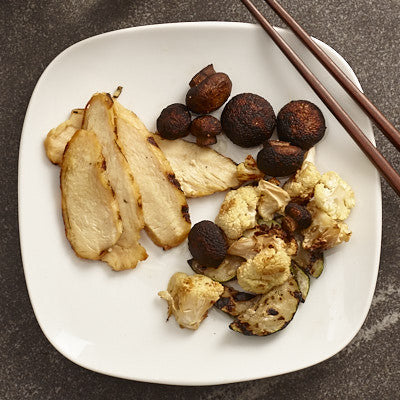 Sliced chicken with a side of roasted vegetables Eat Smart Richmond meal delivery service