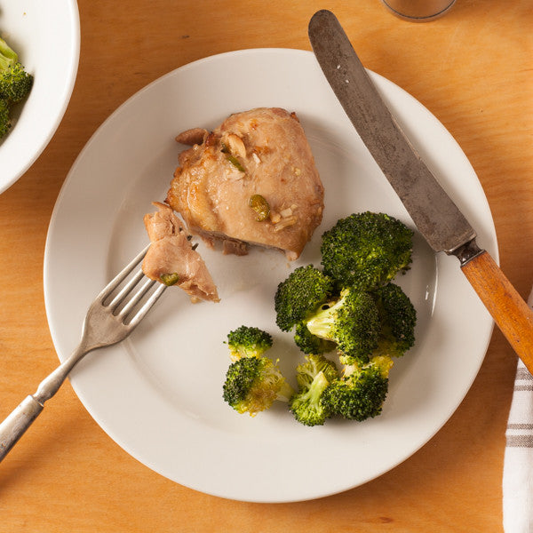 Chicken adobo on a fork with a side of broccoli Eat Smart RVA meal delivery service